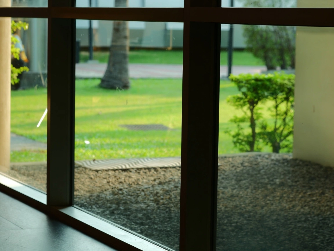 Exterior window film preventing artificial turf melt from window reflection in San Antonio